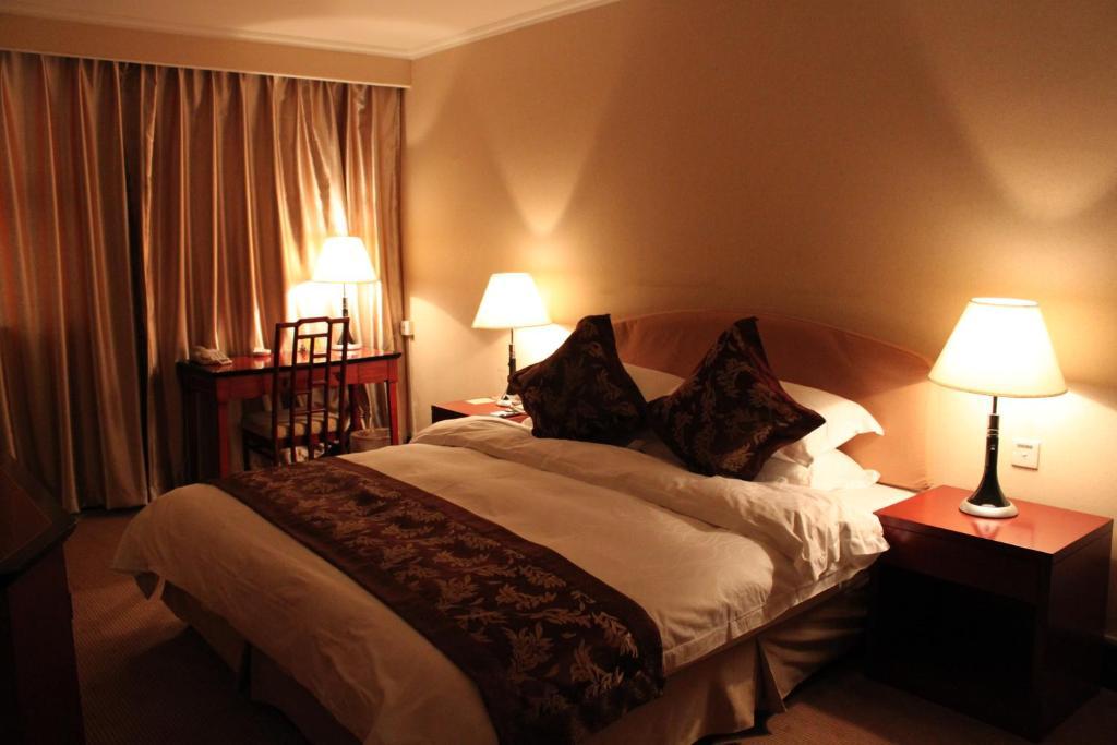 Garden Hotel سوجو الغرفة الصورة